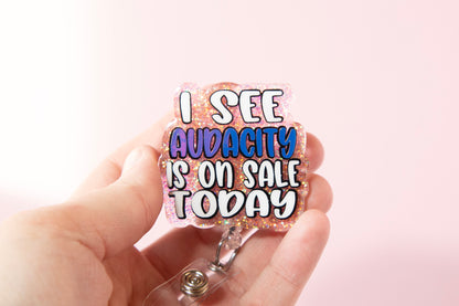 I see Audacity is on Sale Today Funny Glitter Badge Reel