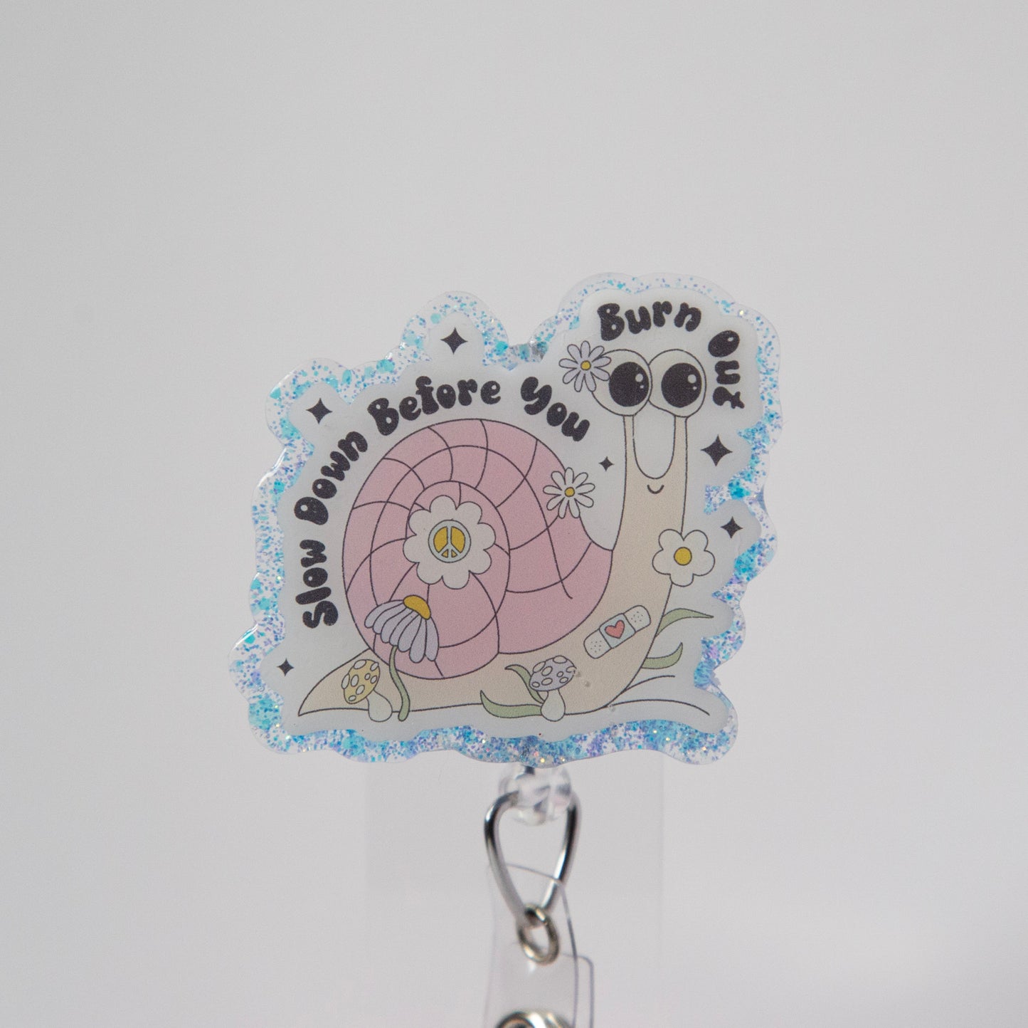 Slow down before you burn out Badge Reel