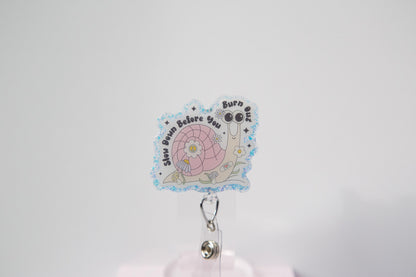 Slow down before you burn out Badge Reel