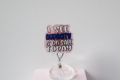 I see Audacity is on Sale Today Funny Glitter Badge Reel